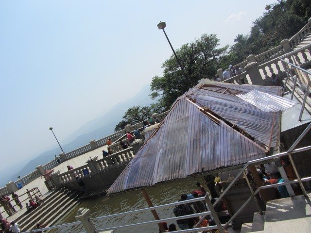 Tried to sneak a picture of the pond and temple on my way out