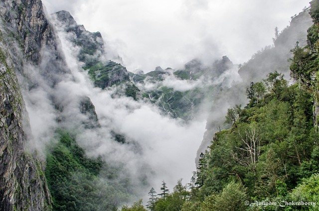 Clouds hovering around the mountain peaks